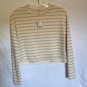Beige and black long sleeve crop top